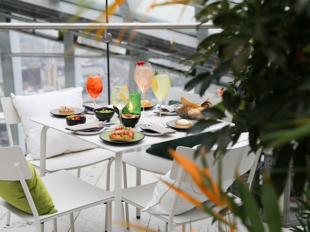 A table on the terrace with food and drink